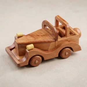 Studio angle of the solid thuya burl wood toy car, showcasing the vintage convertible design, headlamps, and rolling wheels on a neutral stone surface.